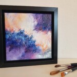 Œuvre de 20 x 20 cm, technique mixte/ toile de lin ( Encadrement noir de 25 x 25 cm _ 4,5 cm d'épaisseur.)